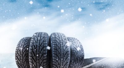Car tires on winter road.